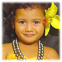 child with black pearl necklace